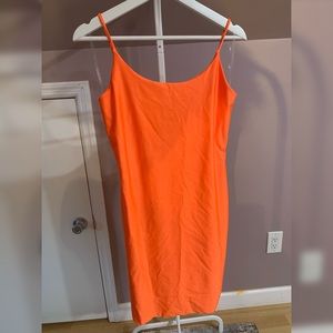 Neon orange bodycon dress